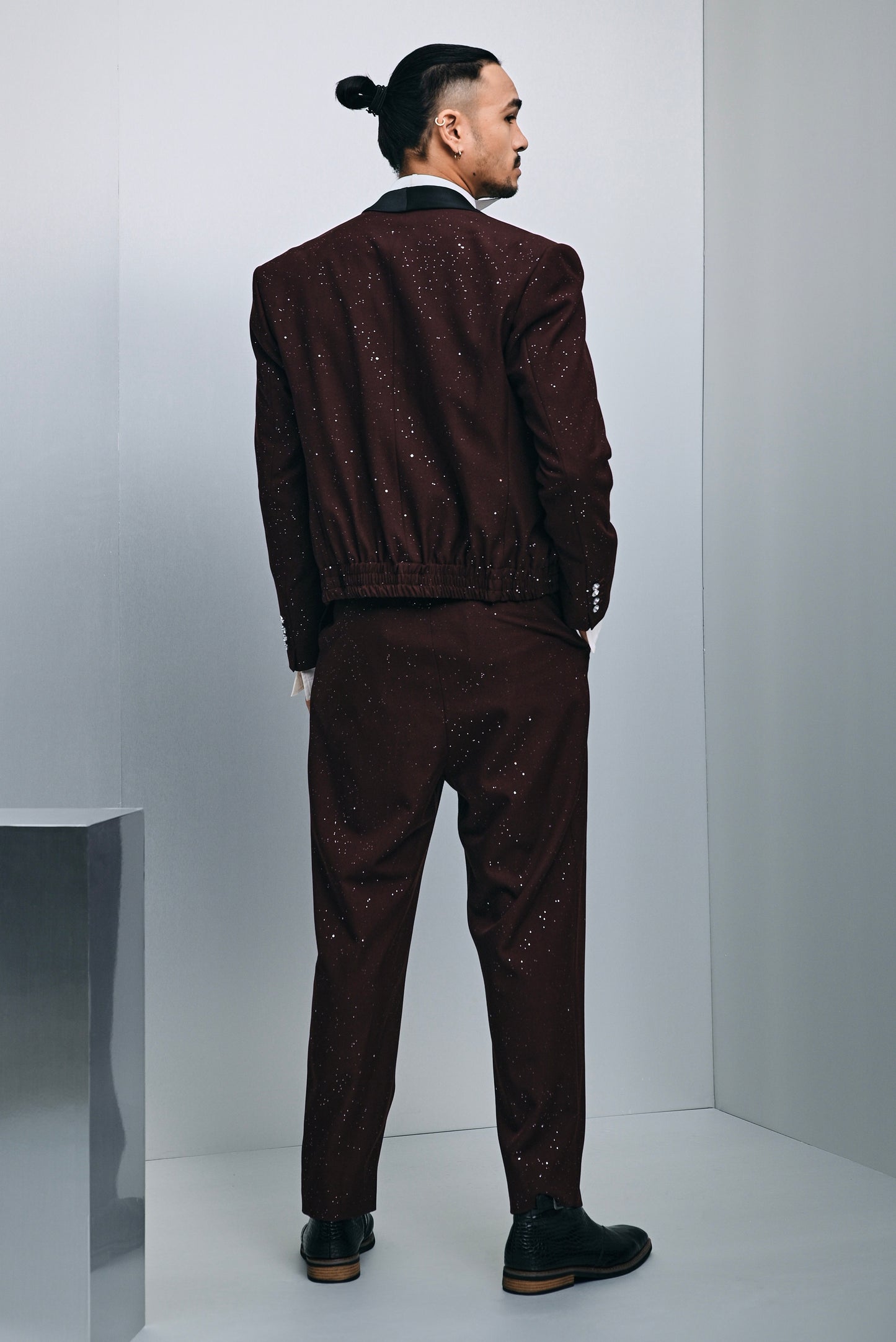 Zander hybrid suit in laminated glitter